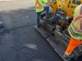 Adding asphalt to a new driveway in Winnipeg