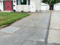 Before image of a driveway repaired and sealed by Superior Asphalt in Winnipeg